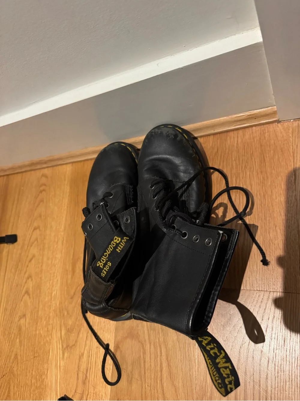 Dr. Martens Black Leather Lace-Up Boots with Yellow Stitching